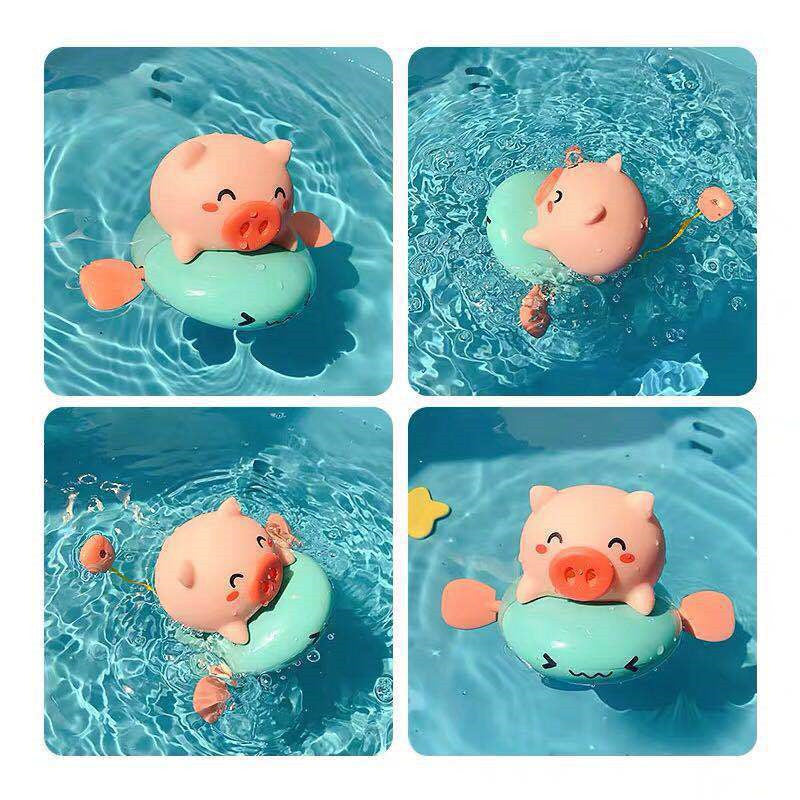 Wind-up swimming pig bath toy – full product view from above – Bambelou UK
