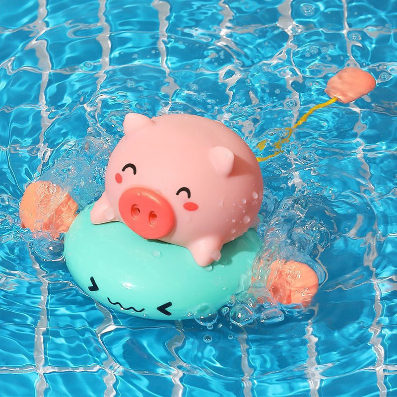 Wind-up swimming pig bath toy – close-up of wind-up mechanism – Bambelou UK