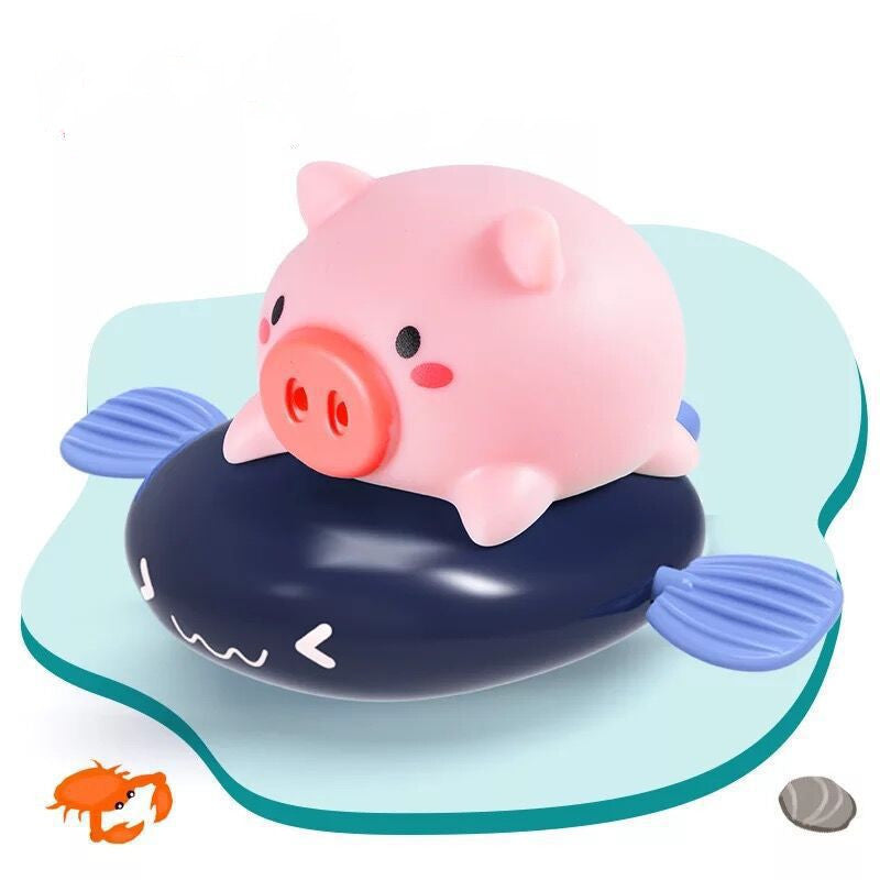 Wind-up swimming pig bath toy – pig swimming across the bath – Bambelou UK