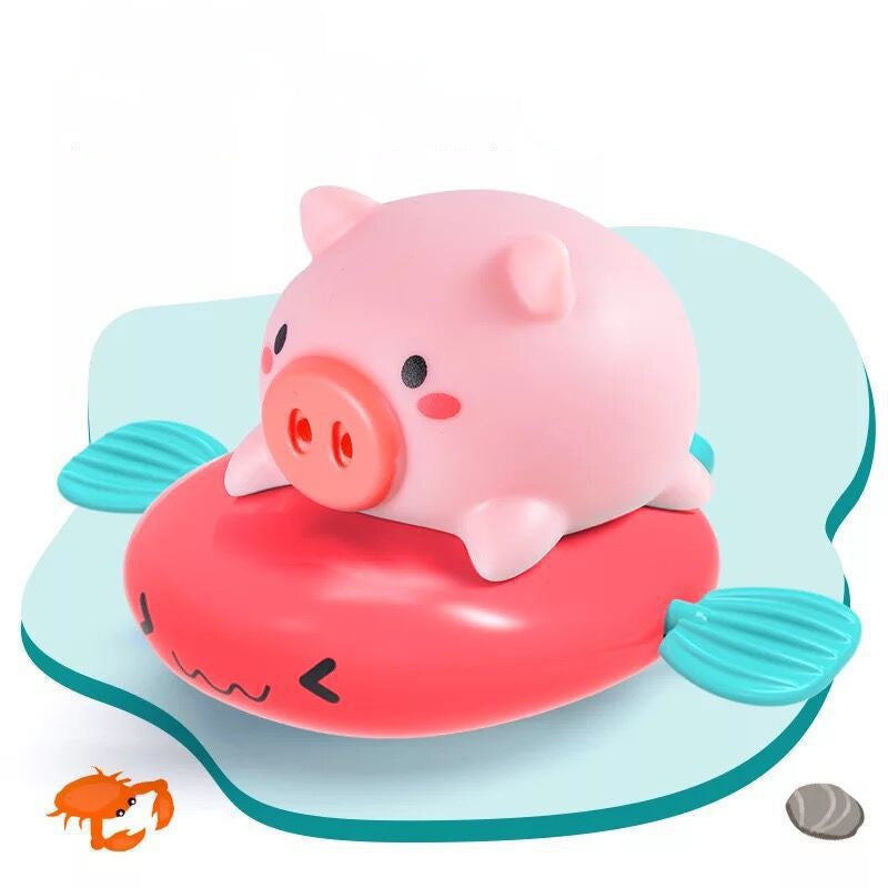 Wind-up swimming pig bath toy – toddler playing with pig in the bath – Bambelou UK